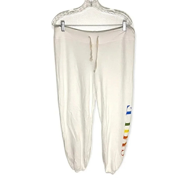 NWOT Sundry Relaxed Fit Slouchy Jogger Sweatpants with Rainbow Smile Text - Picture 1 of 7